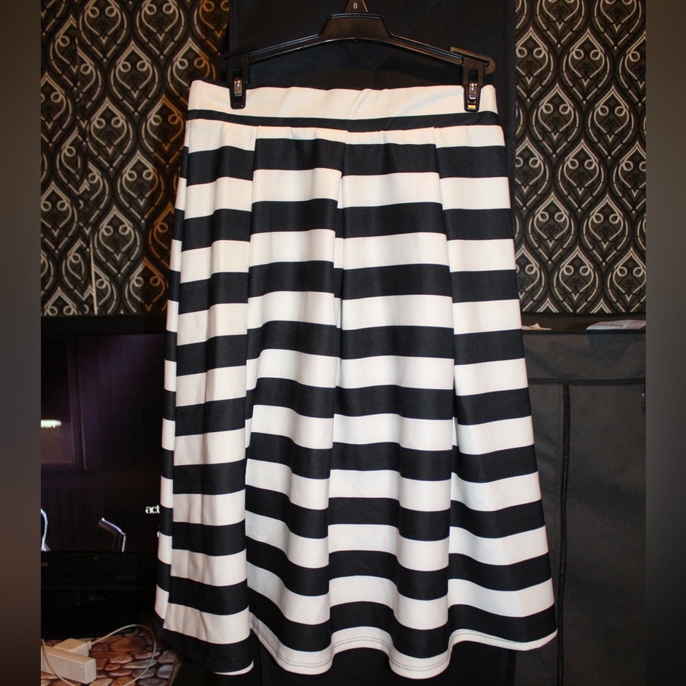 Full Pleated skirt.